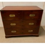 A campaign chest, two drawers over two (H77cm W87cm D45cm)