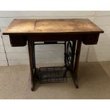 A vintage Cleveland sewing machine table