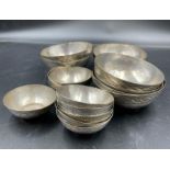 A selection of Nigerian white metal bowls by Aikin Amadu Kano 7 bowls 3" Diameter and 10 bowls at