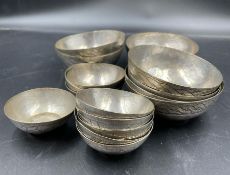 A selection of Nigerian white metal bowls by Aikin Amadu Kano 7 bowls 3" Diameter and 10 bowls at