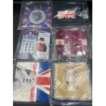 Six United Kingdom Uncirculated coin collection packs for 1990, 1992, 1993, 1994, 1995 and 1998.