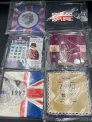 Six United Kingdom Uncirculated coin collection packs for 1990, 1992, 1993, 1994, 1995 and 1998.