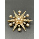 A 9ct gold star brooch decorated with seed pearls (Total Weight 9g)