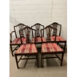 Five George III style mahogany chairs