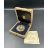 A 1989 United Kingdom £5 Brilliant Uncirculated gold coin in 22ct gold weighing 39.94g in original