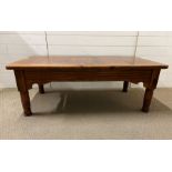 A hardwood coffee table by Dixy Mexico (H48cm W135cm D76cm)