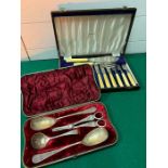 Two boxed sets of cutlery and serving spoons