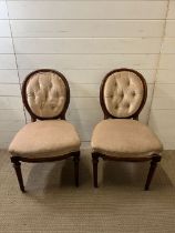 Rocco style side chairs with reeded legs and button backs