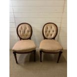 Rocco style side chairs with reeded legs and button backs