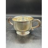 A silver porringer, hallmarked for Birmingham 1933.