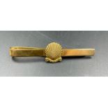 A 9ct gold Shell tie clip (Total Weight 9.3g)