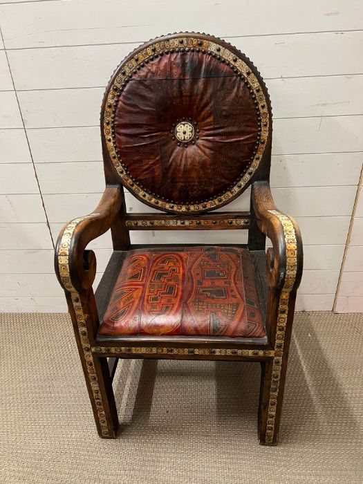 A Moroccan Mother of Pearl ornate chair