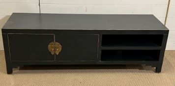 A black media unit by Dunelm Hanna (H46cm W130cm D40cm)