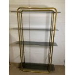 A contemporary metal frame and smoked glass shelving (H180cm W118cm D32cm)