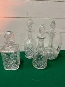 Four cut glass decanters