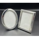 Concorde memorabilia: Two hallmarked silver photo frames, one oval one rectangular