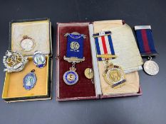 A collection of silver medals and medals for Military Police, dancing silver jubilee etc