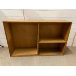 A teak wall unit with shelves (H69cm W110cm D28cm)