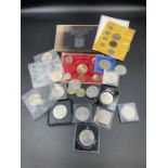 A selection of collectable coins to include a number of crowns, five pound coins, proof coinage of