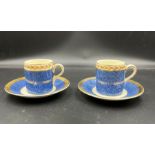 A pair of Crown Ducal coffee cans and saucers