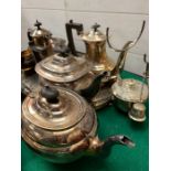 A collection of silver plate teapots, coffee pots, jugs and bowls