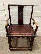 An early 20th century Elm Chinese wedding chair of side Elbow chair