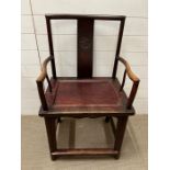 An early 20th century Elm Chinese wedding chair of side Elbow chair