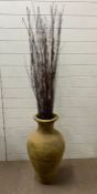 A floor standing urn/vase with willow, and stand