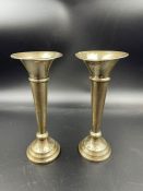 A Pair of silver single stem vases 11cm high and hallmarked for Birmingham 1908 by Robert Pringle