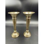 A Pair of silver single stem vases 11cm high and hallmarked for Birmingham 1908 by Robert Pringle