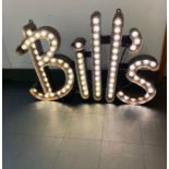 A reclaimed industrial style metal "Bills" sign (137cm x 87cm)