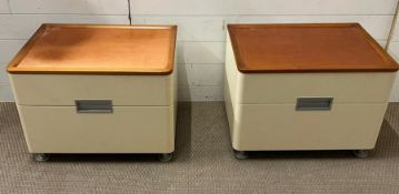 A pair of contemporary bedside tables
