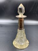 A silver, hallmarked, necked scent bottle.