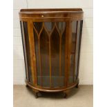 A Demi Lune side cabinet with gazed front (H122cm W87cm D36cm)