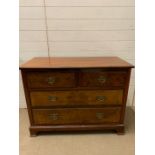 A two over two chest of drawers (H80cm W107cm D50cm)