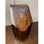 A mahogany serpentine fronted knife box with original fittings