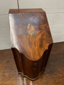 A mahogany serpentine fronted knife box with original fittings