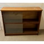 A Mid Century glazed bookcase (H76cm W100cm D29cm)