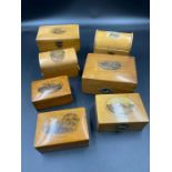 A selection of seven mauchline ware boxes, various styles