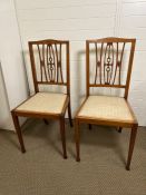 A pair of side chairs by Jas. Shoolbred and Co London