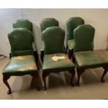 Six library style dining chairs with pad feet, solid frames but leather worn and stud details