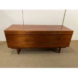 A Mid Century teak storage unit (H60cm W138cm D53cm)