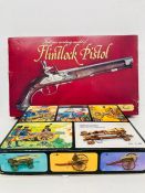 A boxed full size working model of a Flintlock pistol and a boxed boxed Cannone Del XV Secolo