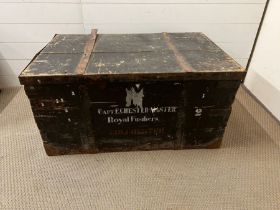 A large wooden and metal bound trunk, inscribed Captain E Chester Master Royal Fusiliers