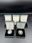 Five silver proof two pound coins, boxed with original paperwork.