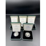 Five silver proof two pound coins, boxed with original paperwork.