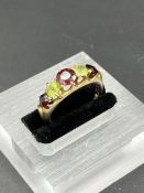 An 18ct gold, four stone ring(Total Weight 4.7g) Size O