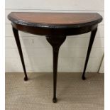 A mahogany Demi Lune side table with string inlay (H72cm W76cm)