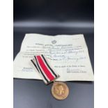A Surrey Special Constabulary Long Service medal along with citation for Mr Leonard Bristow.