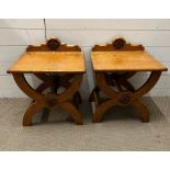 A pair of oak X frame side tables with Tudor rose crest to back